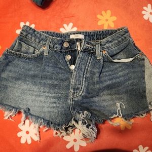 Forever 21 denim shorts, size 26, medium wash, distressed bottom